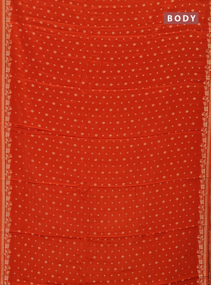 Semi mysore silk saree rust shade with allover zari woven buttas and zari woven border