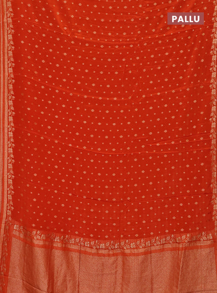 Semi mysore silk saree rust shade with allover zari woven buttas and zari woven border