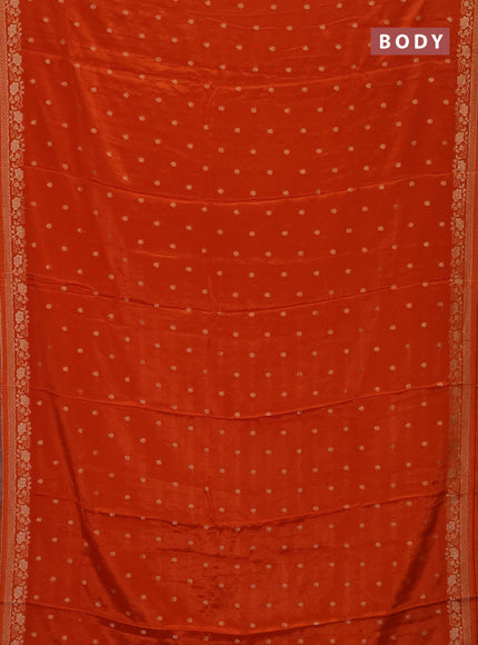 Semi mysore silk saree rust shade with allover zari woven buttas and zari woven border