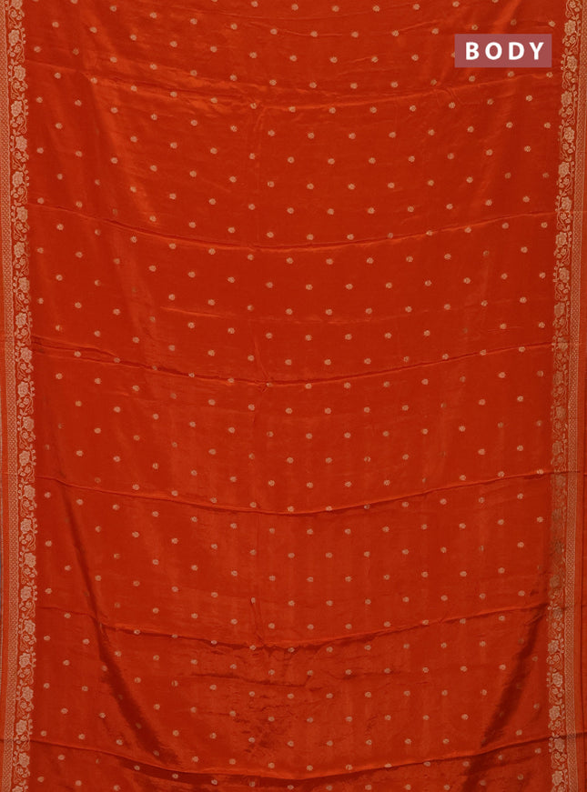 Semi mysore silk saree rust shade with allover zari woven buttas and zari woven border