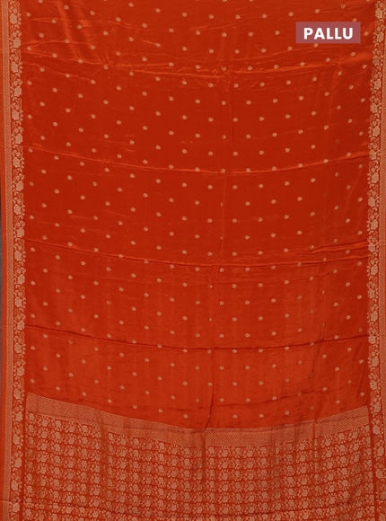 Semi mysore silk saree rust shade with allover zari woven buttas and zari woven border