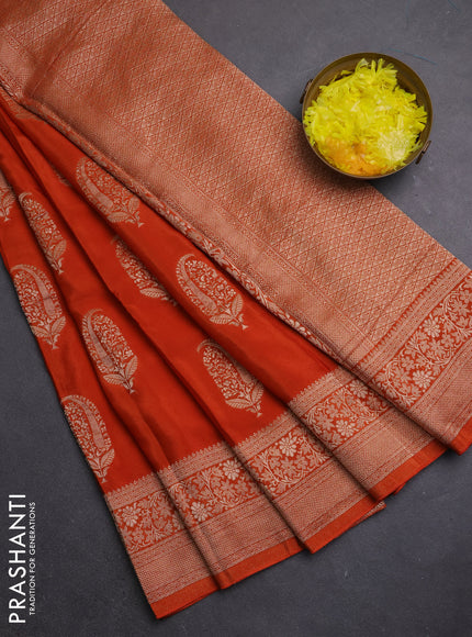 Semi mysore silk saree rustic orange with zari woven buttas and long zari woven border
