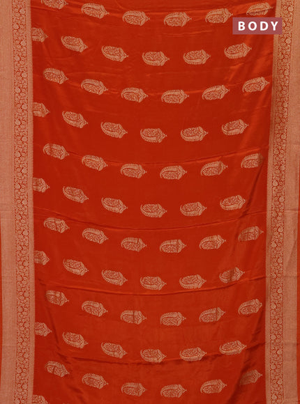 Semi mysore silk saree rustic orange with zari woven buttas and long zari woven border