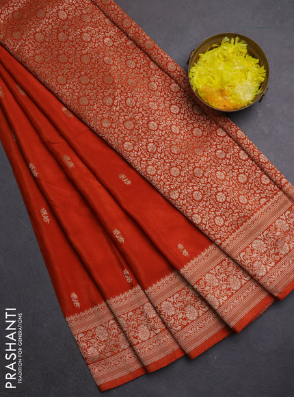 Semi mysore silk saree rustic orange with allover zari woven buttas and long zari woven border