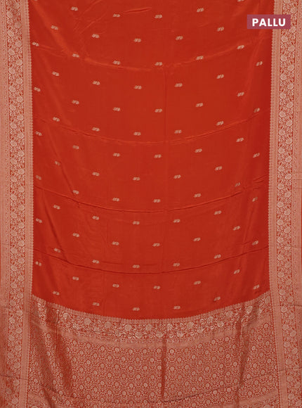 Semi mysore silk saree rustic orange with allover zari woven buttas and long zari woven border