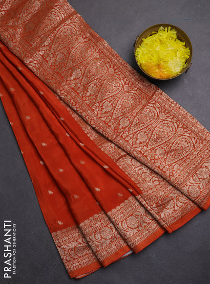 Semi mysore silk saree rust shade with allover zari woven buttas and zari woven border