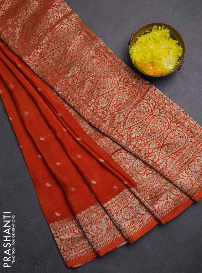 Semi mysore silk saree rust shade with allover zari woven buttas and zari woven border