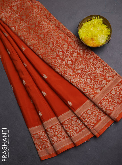 Semi mysore silk saree rust shade with allover zari woven buttas and zari woven border