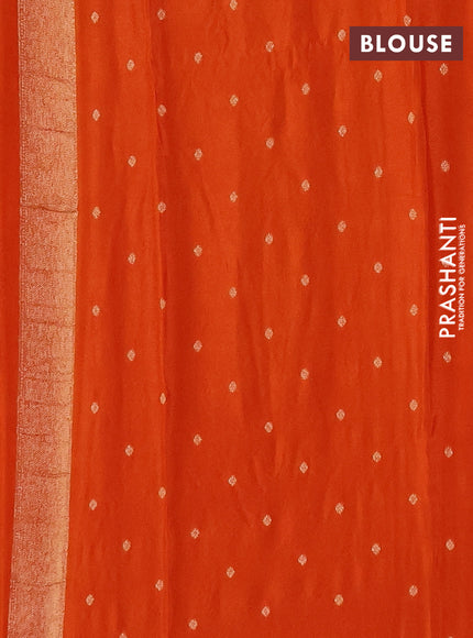 Semi mysore silk saree rust shade with allover zari woven buttas and zari woven border