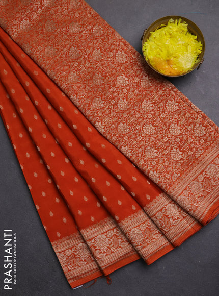 Semi mysore silk saree rust shade with allover zari woven buttas and zari woven border