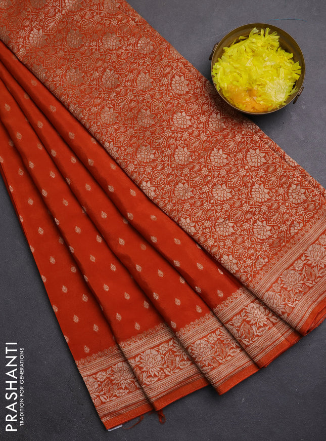 Semi mysore silk saree rust shade with allover zari woven buttas and zari woven border