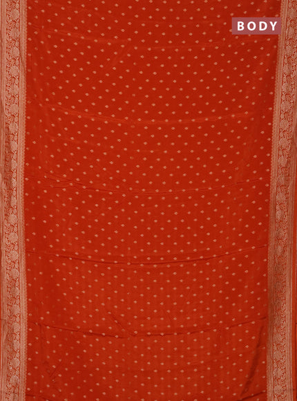 Semi mysore silk saree rust shade with allover zari woven buttas and zari woven border