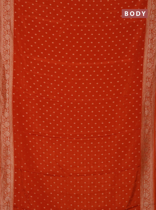 Semi mysore silk saree rust shade with allover zari woven buttas and zari woven border