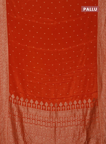 Semi mysore silk saree rust shade with allover zari woven buttas and zari woven border