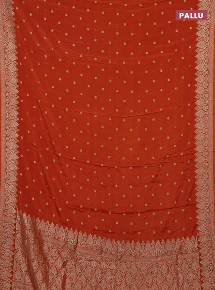 Semi mysore silk saree rust shade with allover zari woven buttas and zari woven border