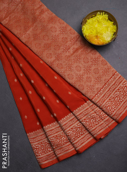 Semi mysore silk saree rust shade with allover zari woven buttas and zari woven border