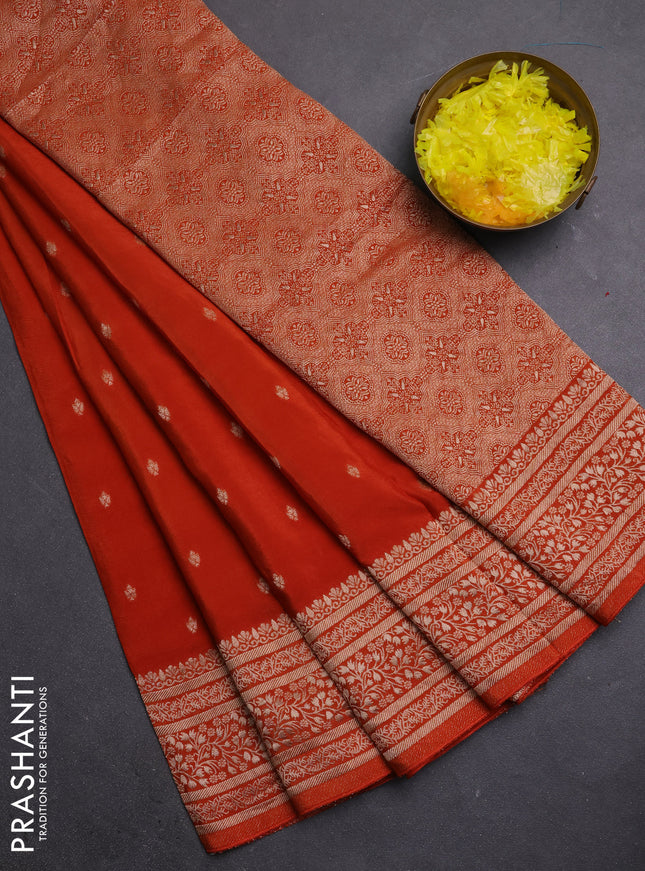 Semi mysore silk saree rust shade with allover zari woven buttas and zari woven border