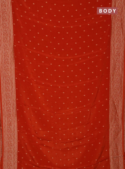 Semi mysore silk saree rust shade with allover zari woven buttas and zari woven border