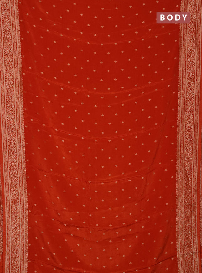 Semi mysore silk saree rust shade with allover zari woven buttas and zari woven border