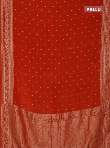 Semi mysore silk saree rust shade with allover zari woven buttas and zari woven border