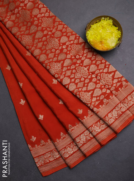 Semi mysore silk saree rust shade with allover zari woven buttas and zari woven border