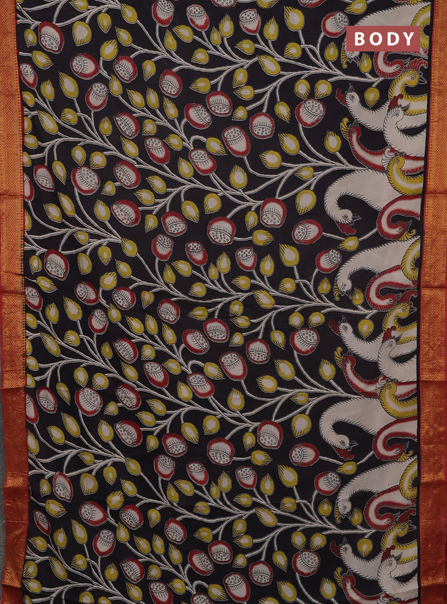 Kalamkari semi silk saree black and rustic orange with allover prints and mangalgiri border