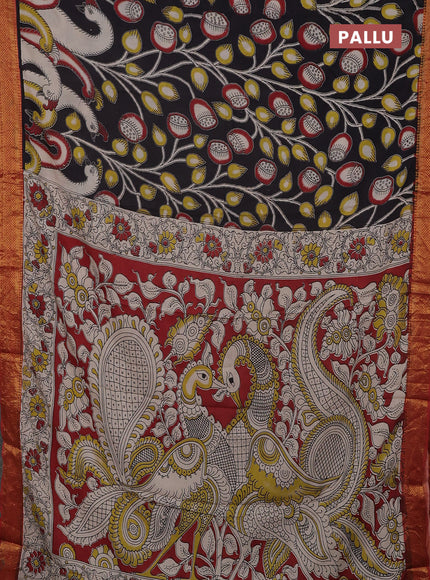 Kalamkari semi silk saree black and rustic orange with allover prints and mangalgiri border