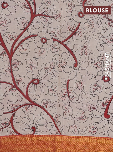 Kalamkari semi silk saree black and rustic orange with allover prints and mangalgiri border