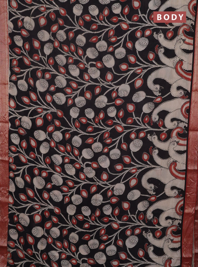 Kalamkari semi silk saree black and rust shade with allover prints and mangalgiri border