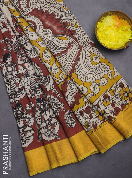 Kalamkari semi silk saree coffee brown and yellow with allover prints and mangalgiri border