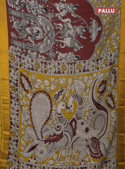 Kalamkari semi silk saree coffee brown and yellow with allover prints and mangalgiri border