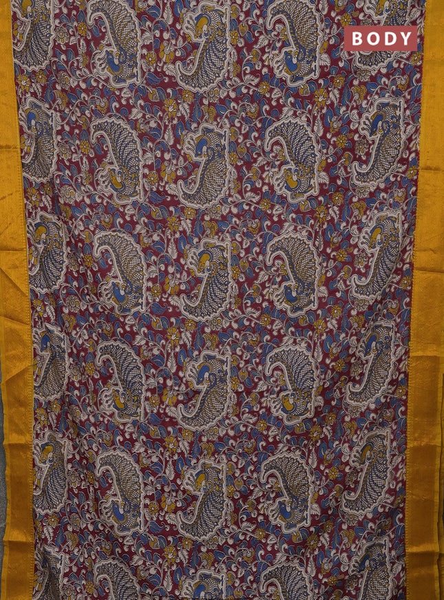 Kalamkari semi silk saree deep maroon and yellow with allover prints and mangalgiri border