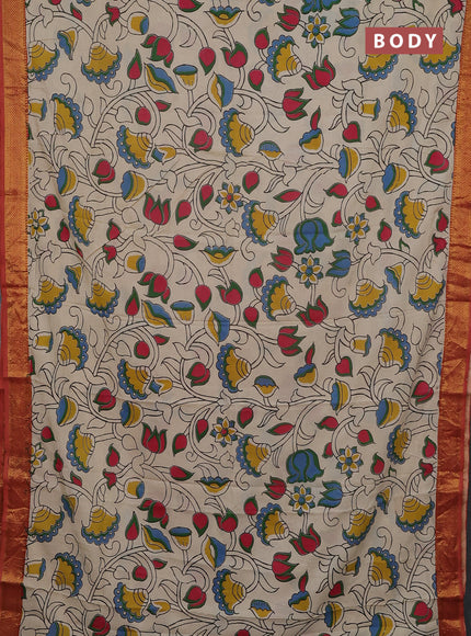 Kalamkari semi silk saree beige and rust shade with allover prints and mangalgiri border