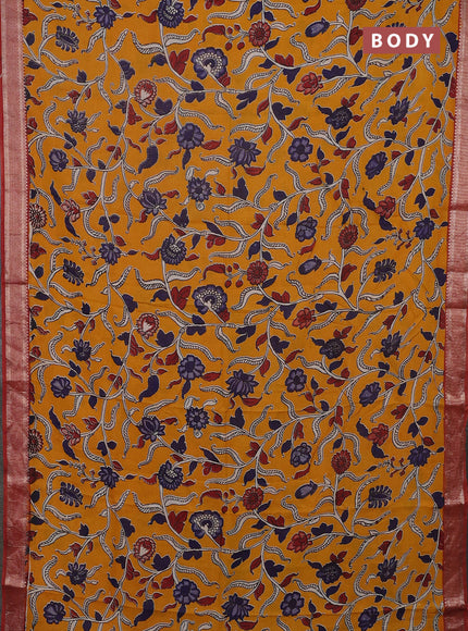 Kalamkari semi silk saree mustard yellow and rust shade with allover prints and mangalgiri border