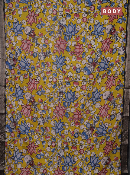 Kalamkari semi silk saree yellow and black with allover prints and mangalgiri border
