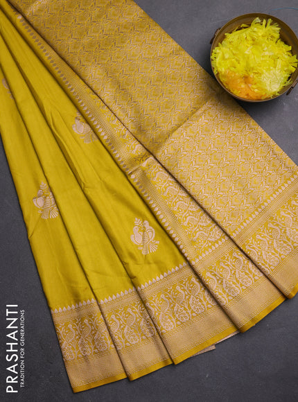 Semi soft silk saree lime yellow with zari woven buttas and zari woven border