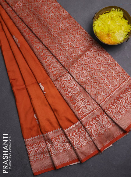 Semi soft silk saree rust shade with zari woven buttas and zari woven border