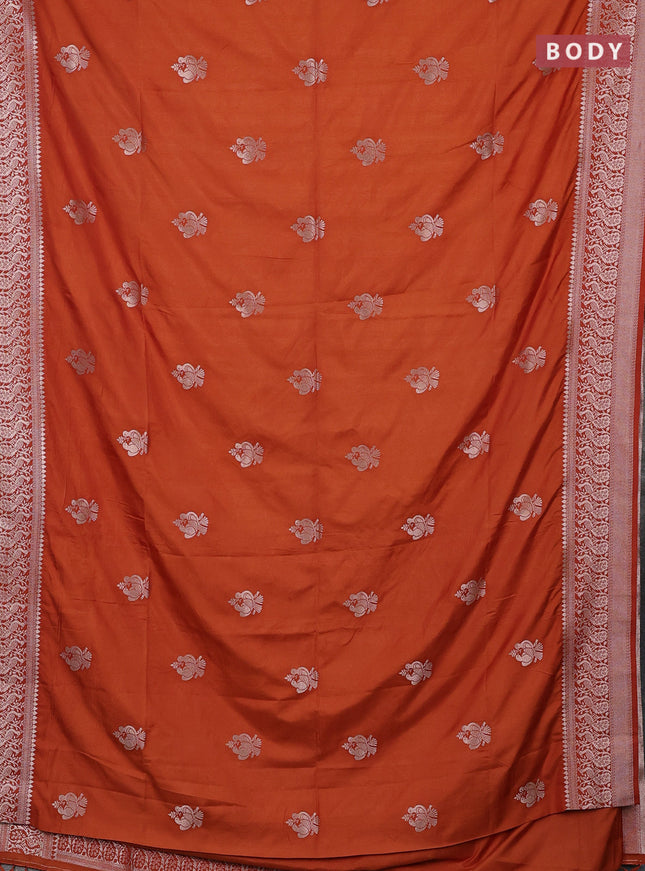 Semi soft silk saree rust shade with zari woven buttas and zari woven border