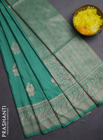 Semi soft silk saree green shade with zari woven buttas and zari woven border