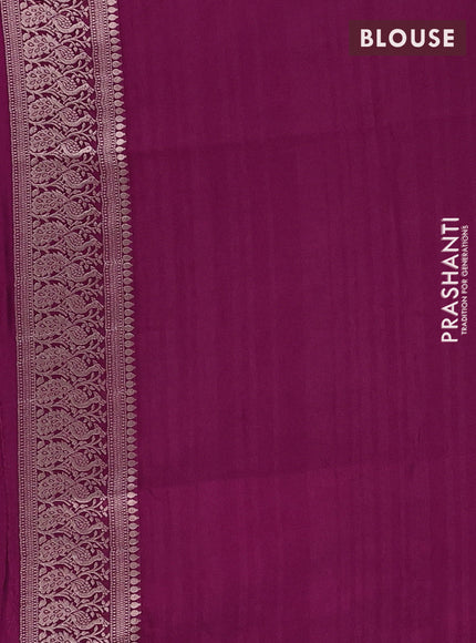 Semi soft silk saree wine shade with zari woven buttas and zari woven border