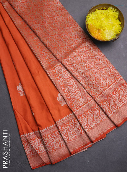 Semi soft silk saree rust shade with zari woven buttas and zari woven border