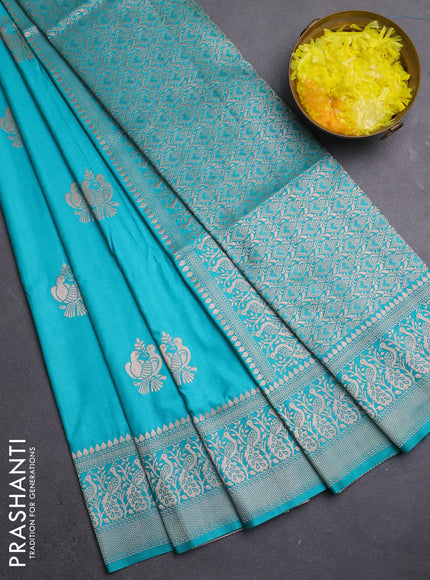 Semi soft silk saree teal green with zari woven buttas and zari woven border