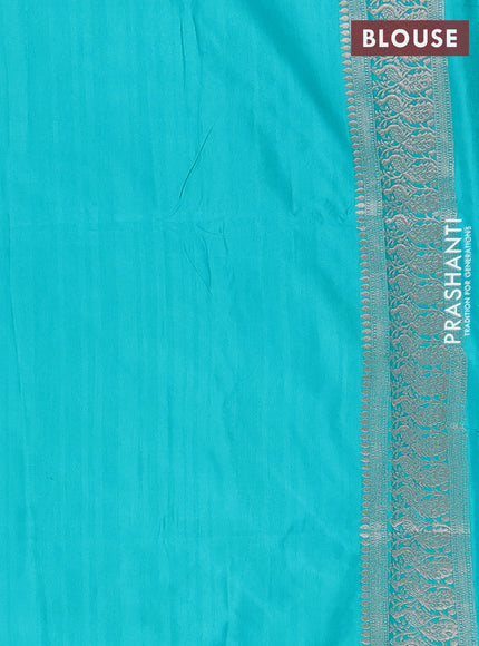 Semi soft silk saree teal green with zari woven buttas and zari woven border