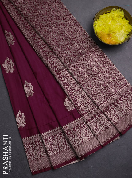 Semi soft silk saree wine shade with zari woven buttas and zari woven border
