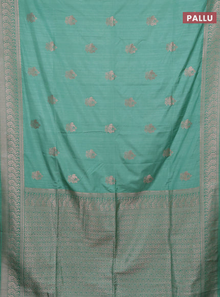 Semi soft silk saree pastel green with zari woven buttas and zari woven border