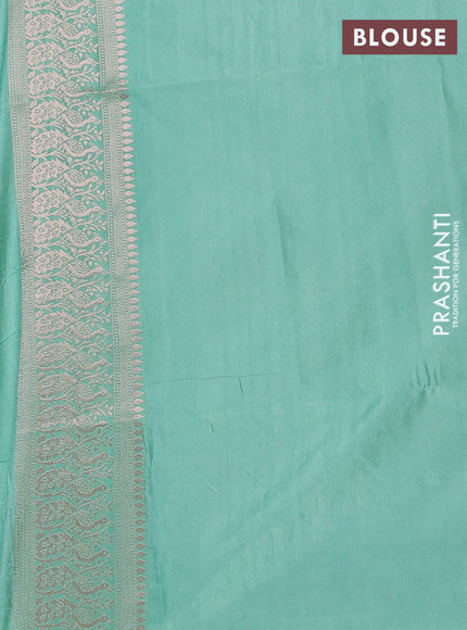 Semi soft silk saree pastel green with zari woven buttas and zari woven border