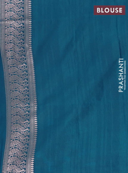 Semi soft silk saree peacock green with zari woven buttas and zari woven border