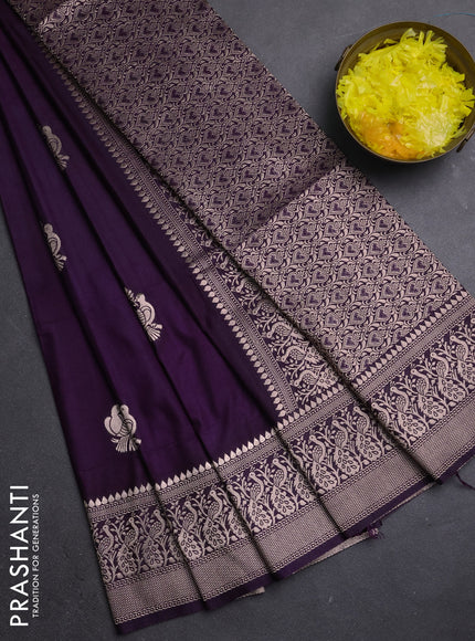 Semi soft silk saree violet with zari woven buttas and zari woven border