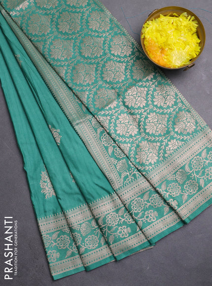 Semi soft silk saree pastel green with zari woven buttas and zari woven border