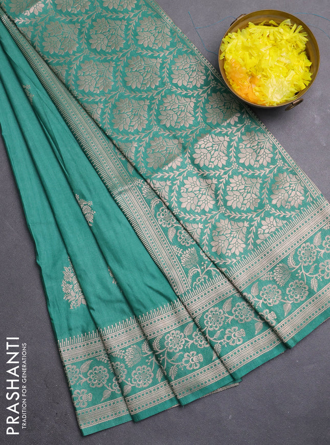 Semi soft silk saree pastel green with zari woven buttas and zari woven border